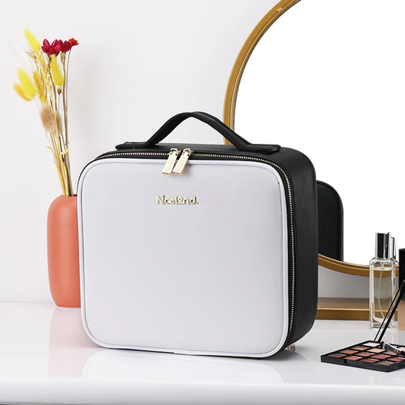 Ninna Vanity Case in White on a vanity table