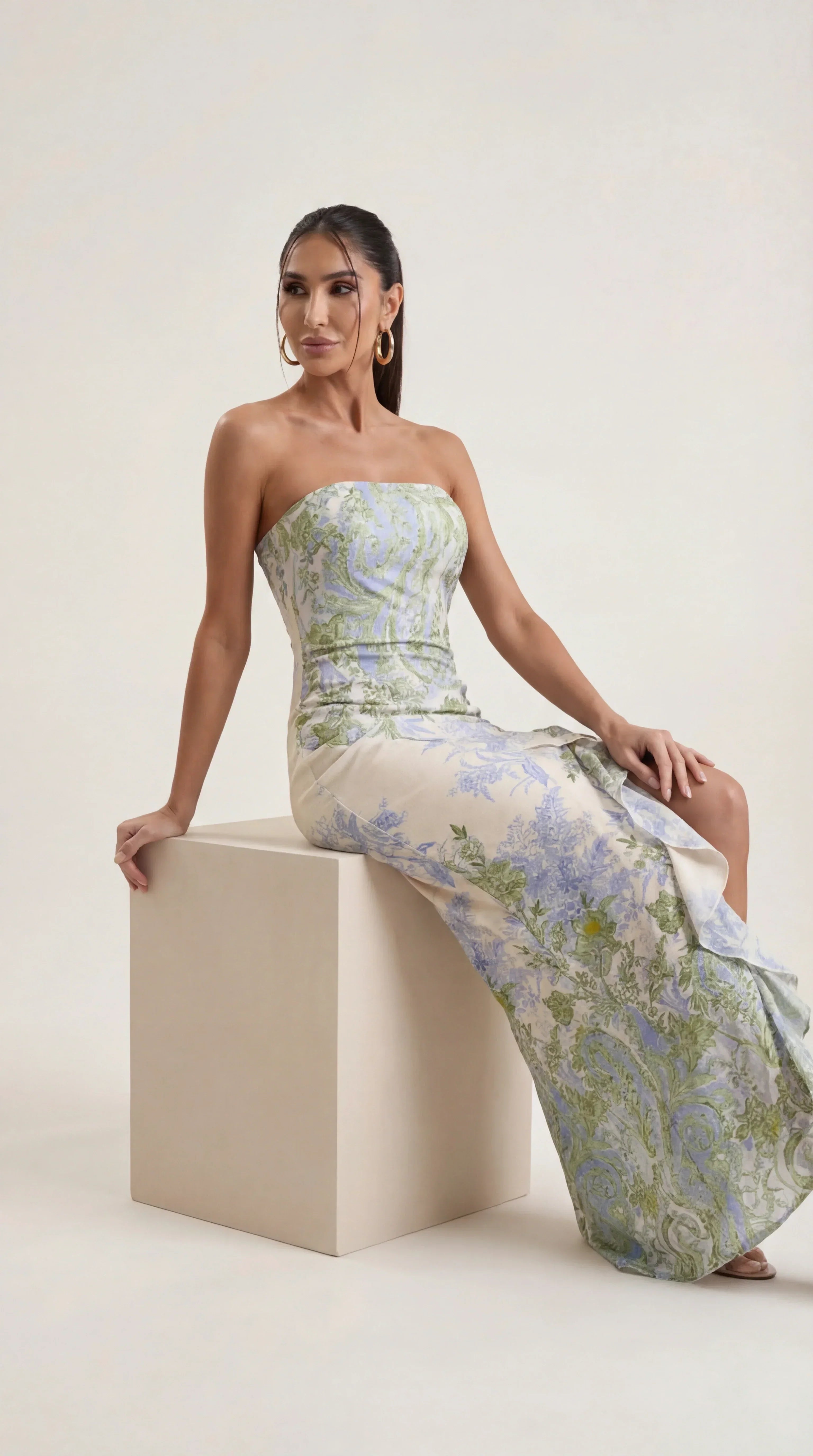 Seated view of the Ninna Amara ruched midi dress
