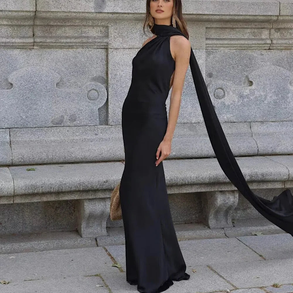 Side train detail on the Amber Glow satin maxi dress