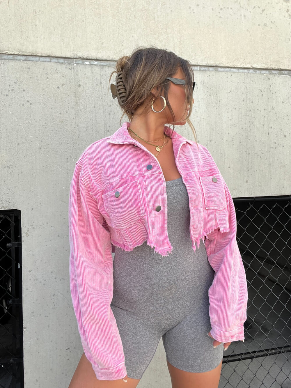 Amelie pink corduroy cropped jacket shown on a model