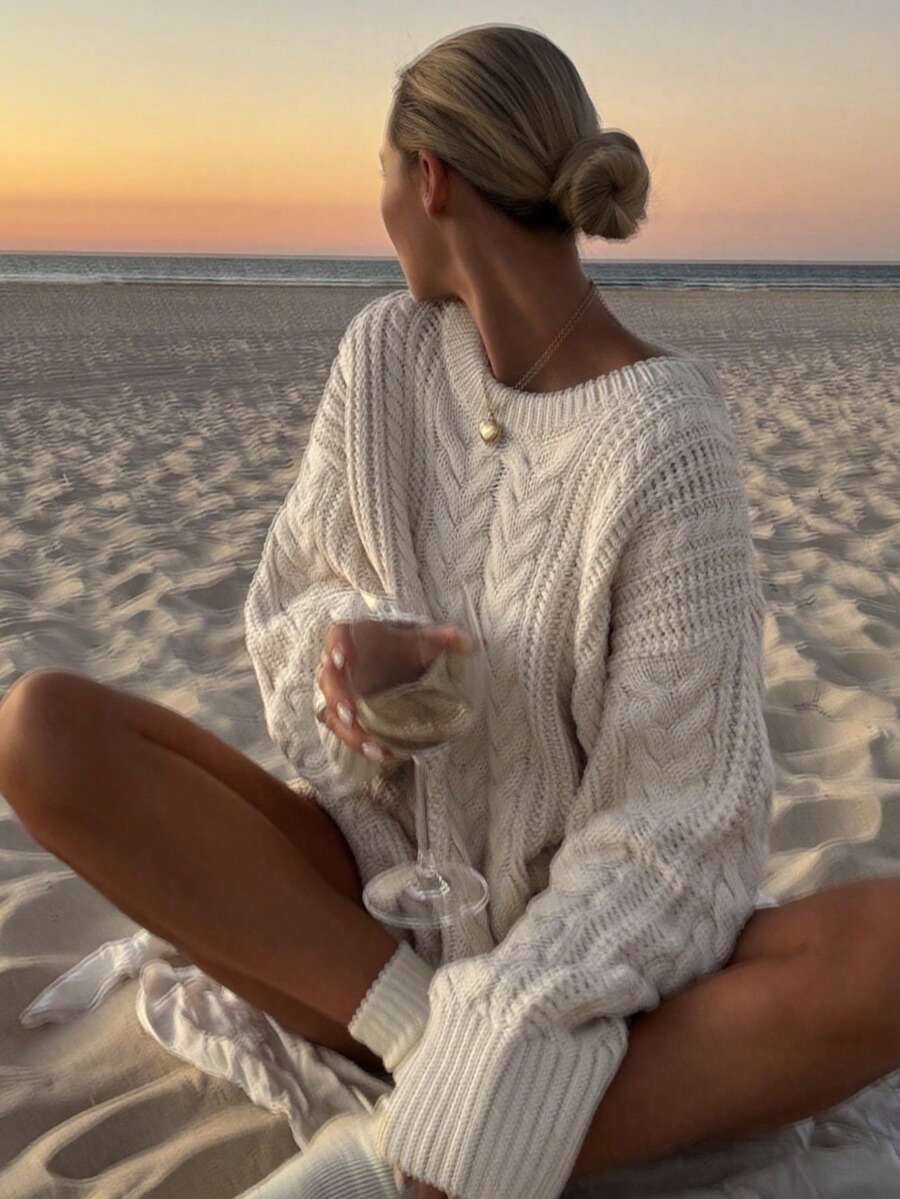 Front view of the Aria cable-knit sweater