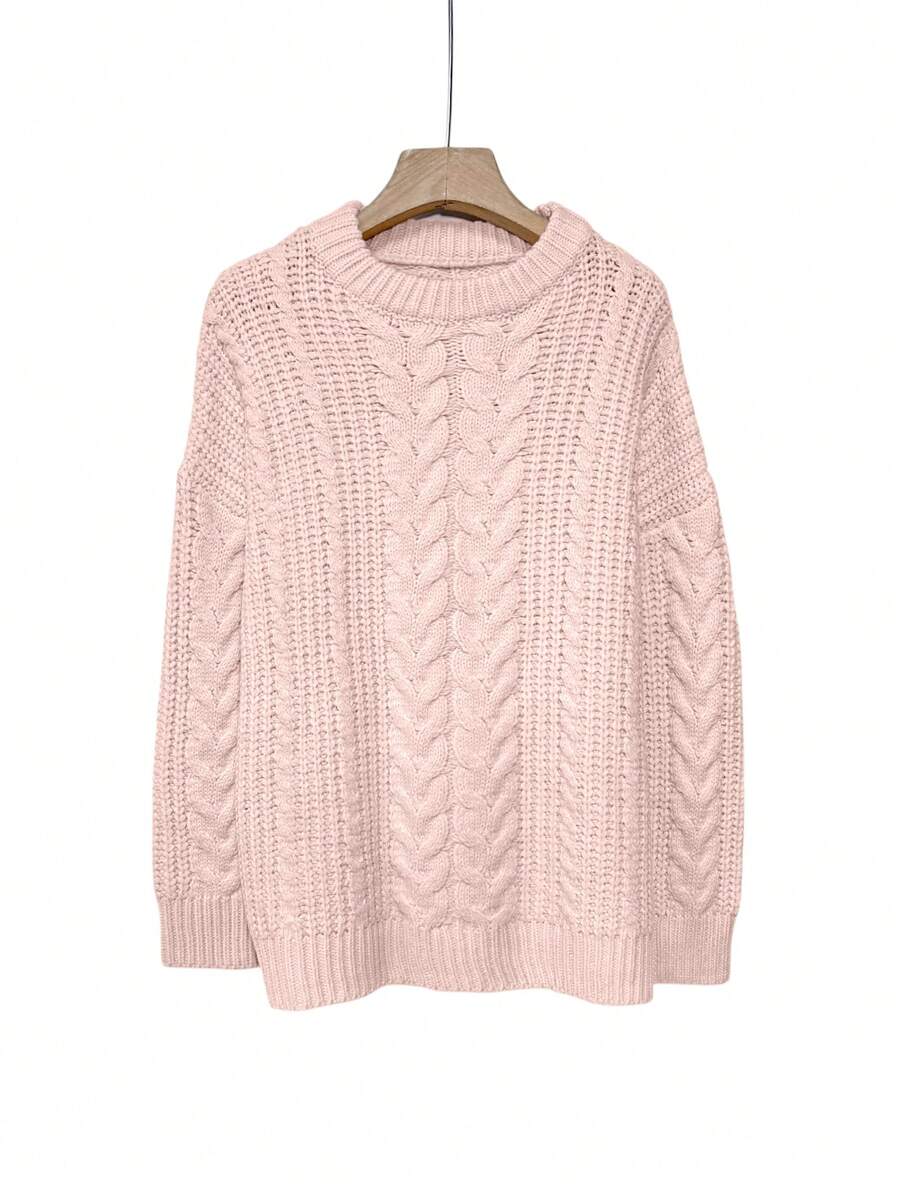 Aria cable-knit sweater layered for cooler weather
