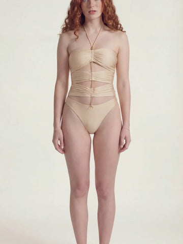 White bodysuit on a neutral studio backdrop, Ninna Brand bodysuits collection