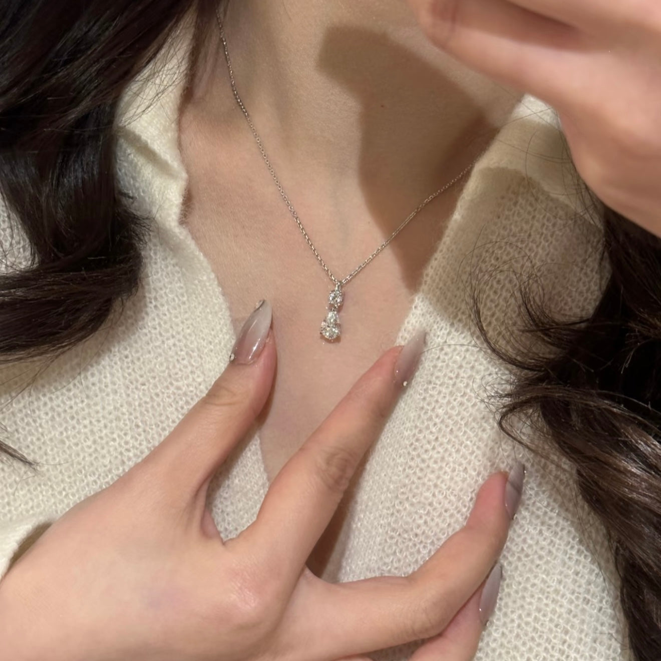 Diamond Dew necklace worn on the neck