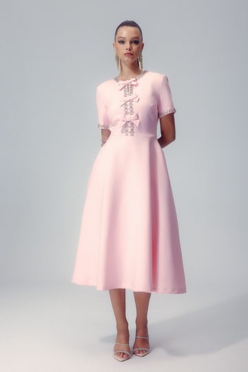 Front view of the Elise crystal bow midi dress