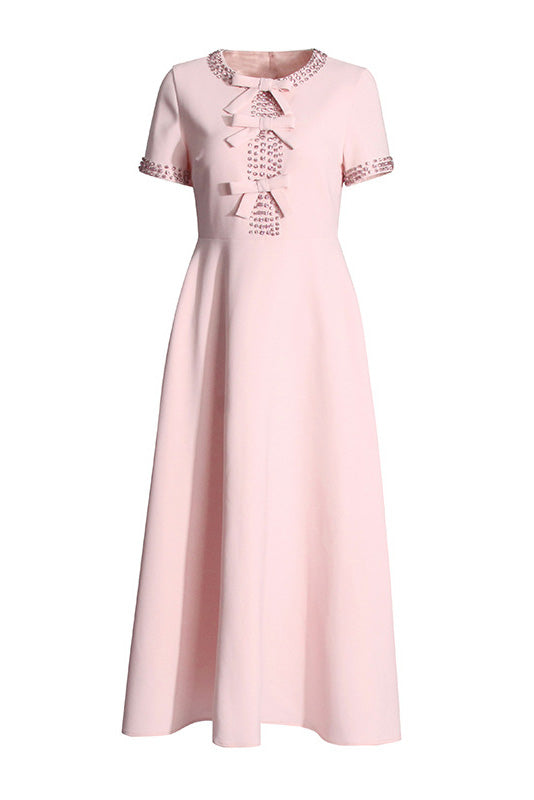 Back view of the Elise crystal bow midi dress