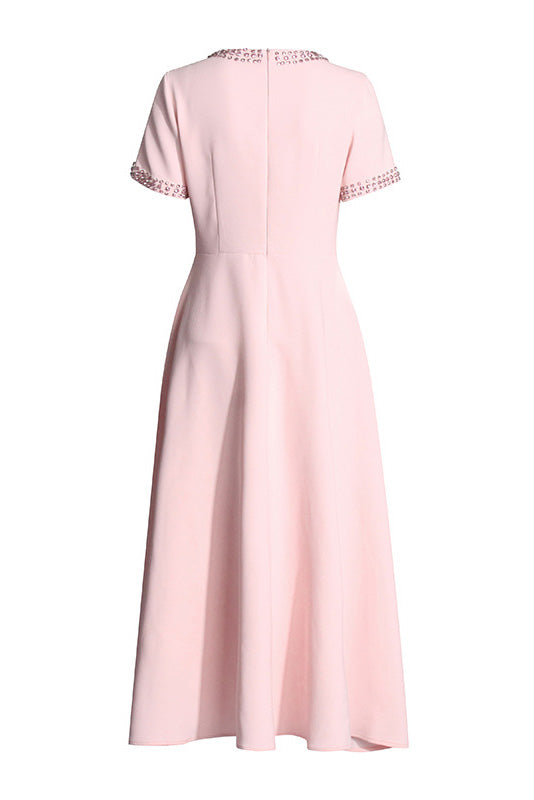 Short sleeve detail on the Elise crystal bow midi dress