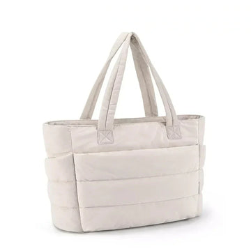 Front view of the Ninna Fluff maxi puffer bag in pink