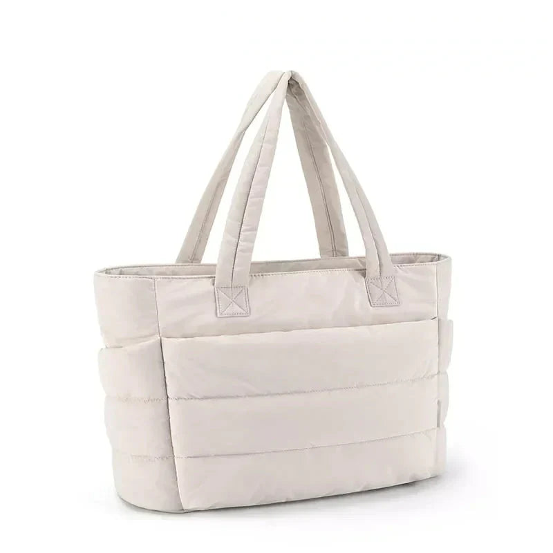 Front view of the Ninna Fluff maxi puffer bag in pink