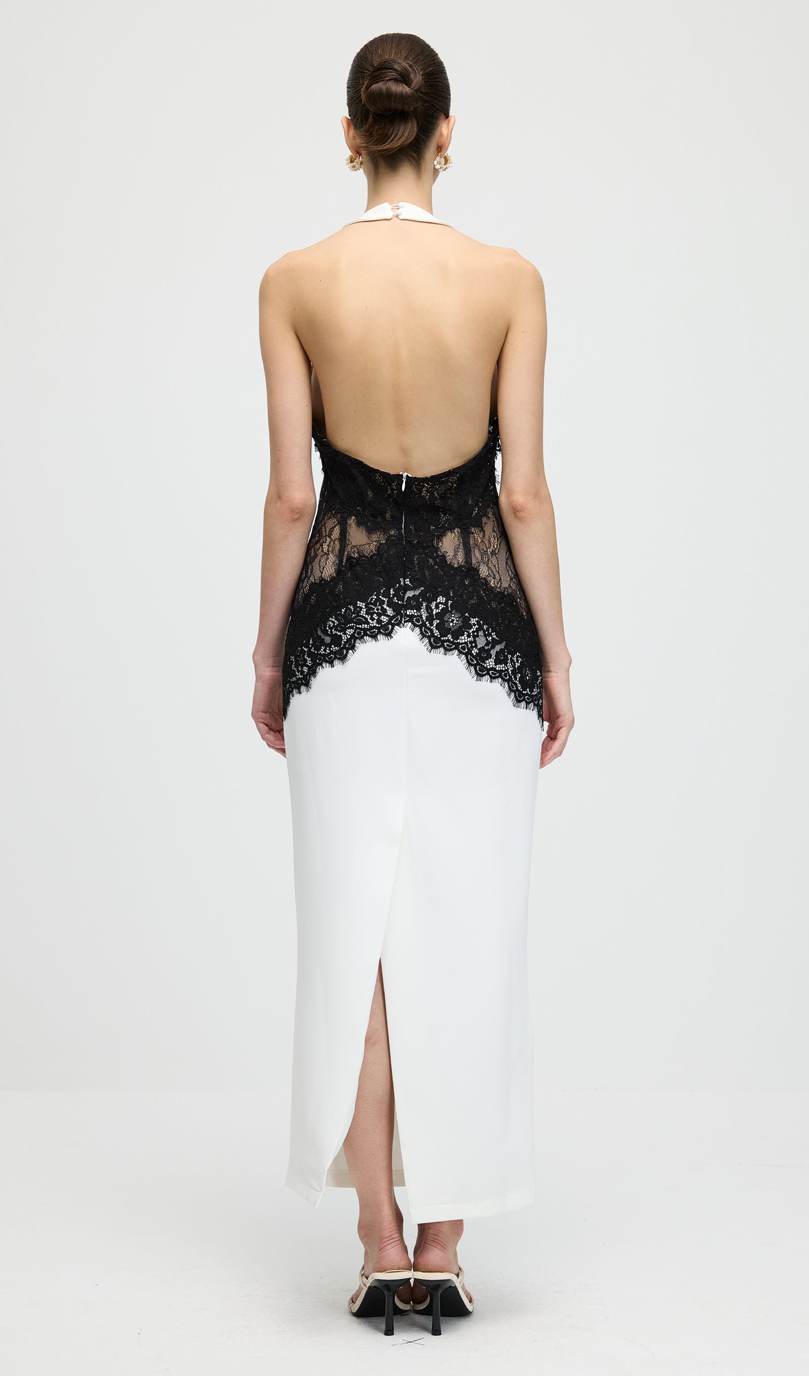 Isadora lace midi dress shown on a model