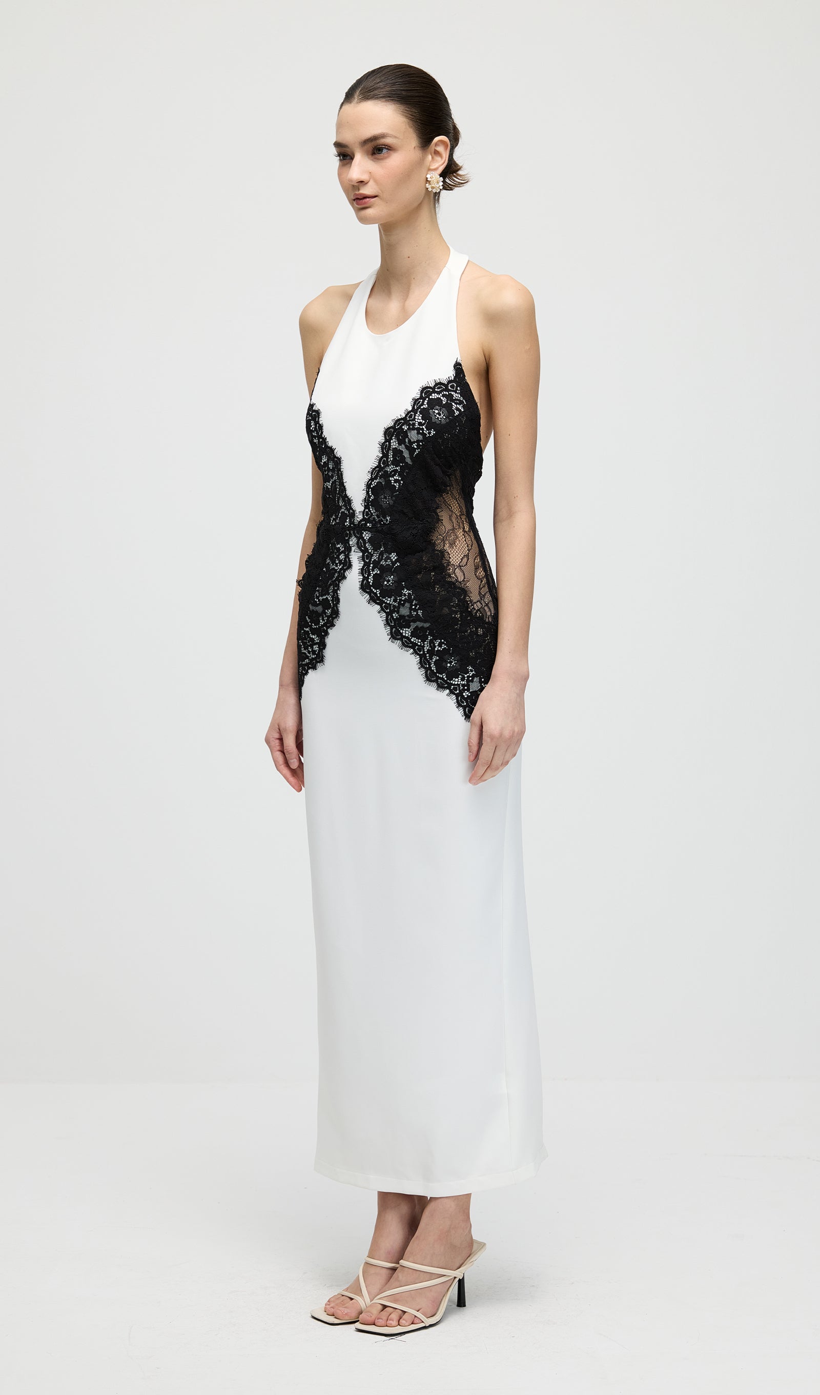 Back view of the Isadora lace midi dress
