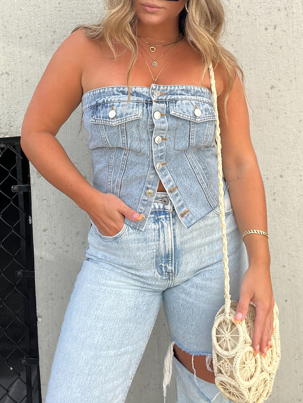 Detail of the button-up front on the London Edge denim corset top