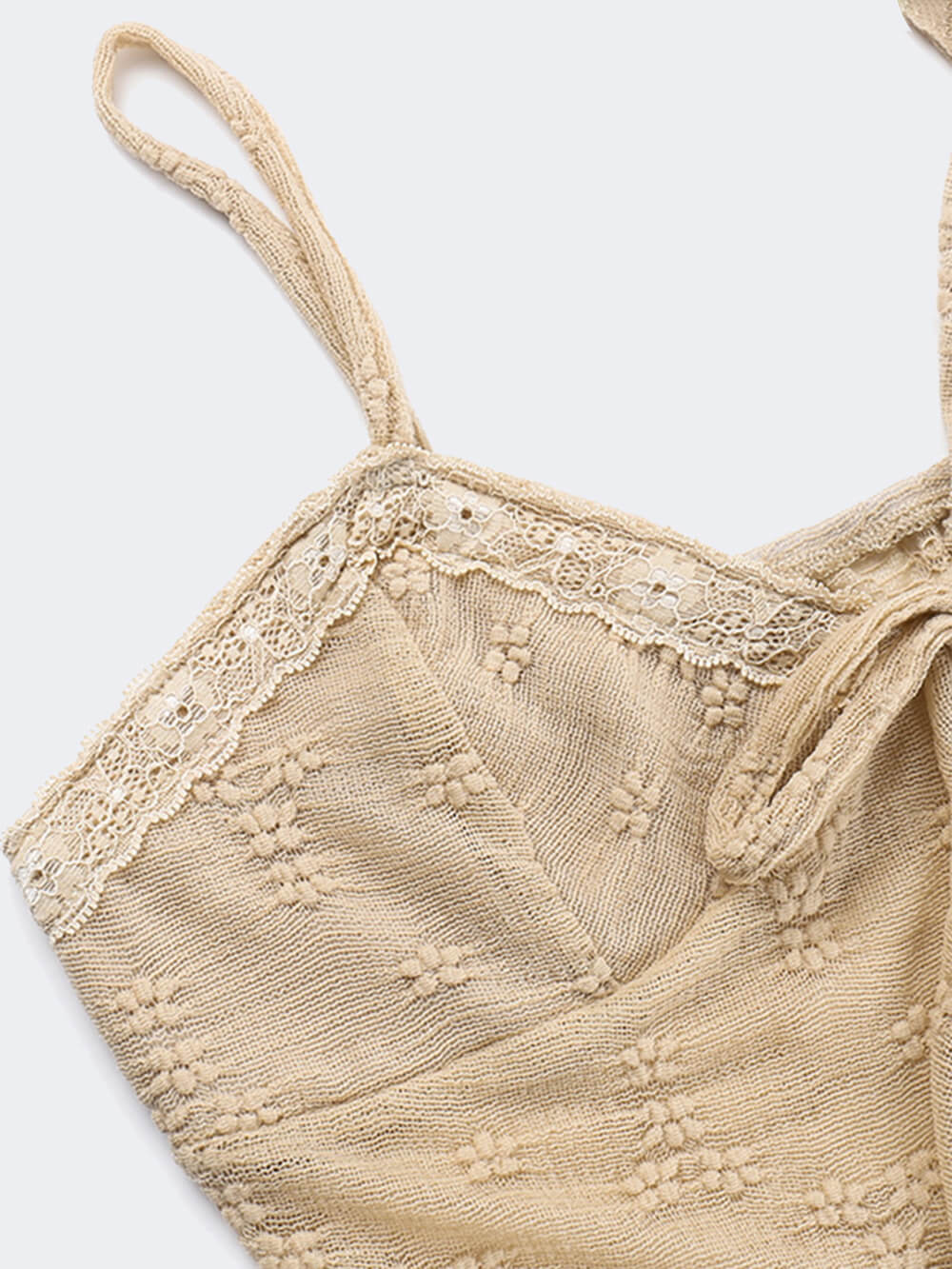 Close-up of the halterneck on the Luxe lace top