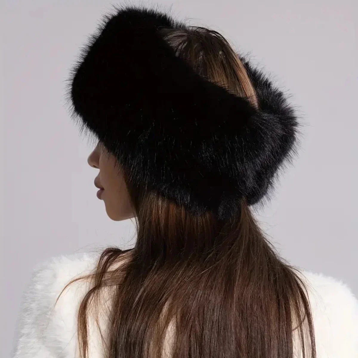 Plush faux fur texture of the Noelle hat