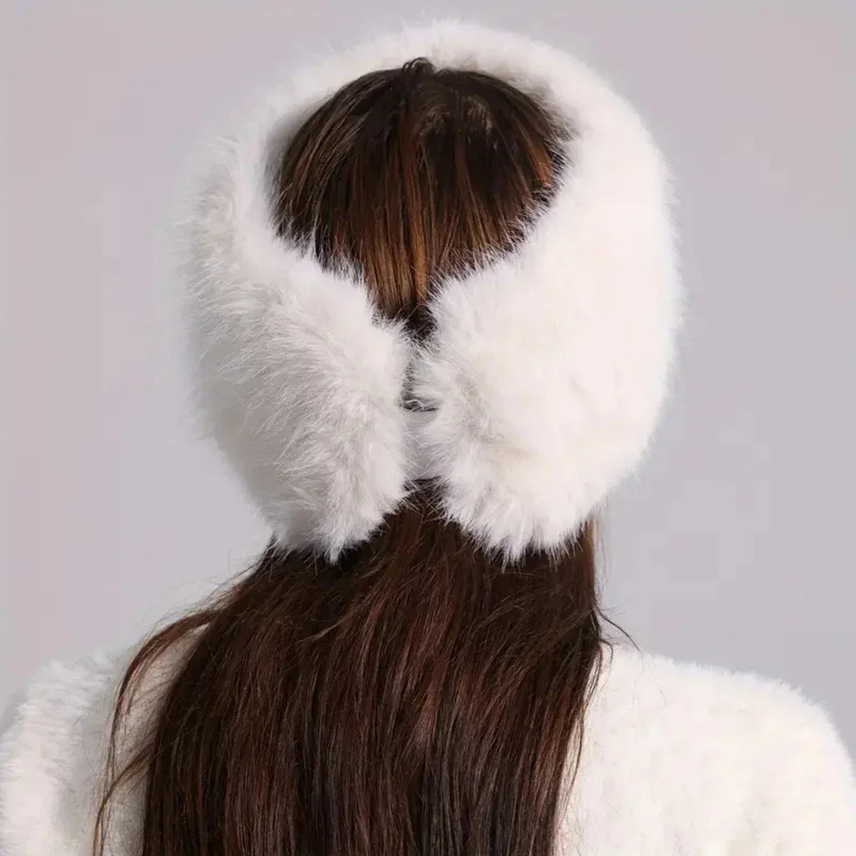 Noelle faux fur hat styled for winter