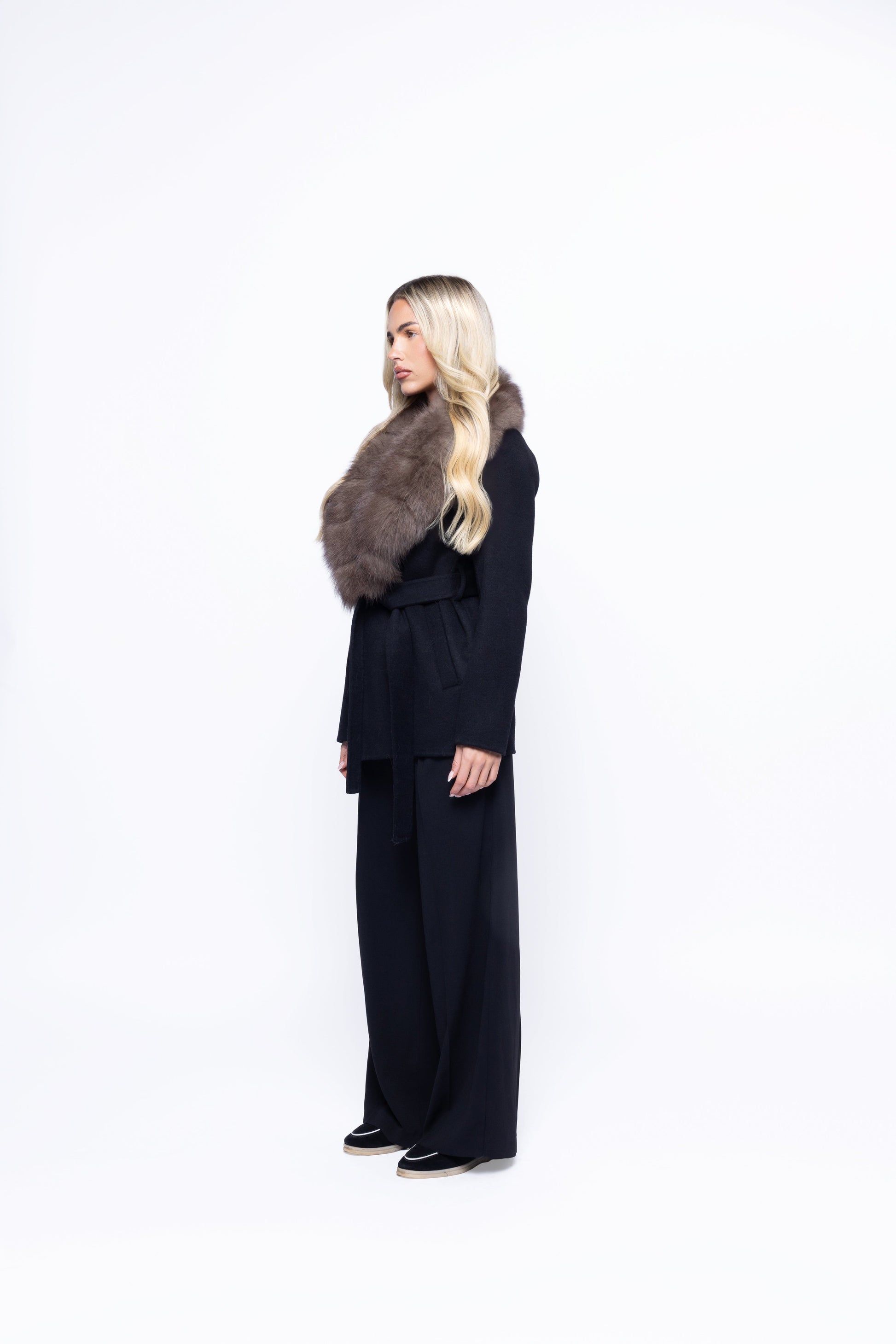 Faux fur front panel detail on the Noir Luxe coat