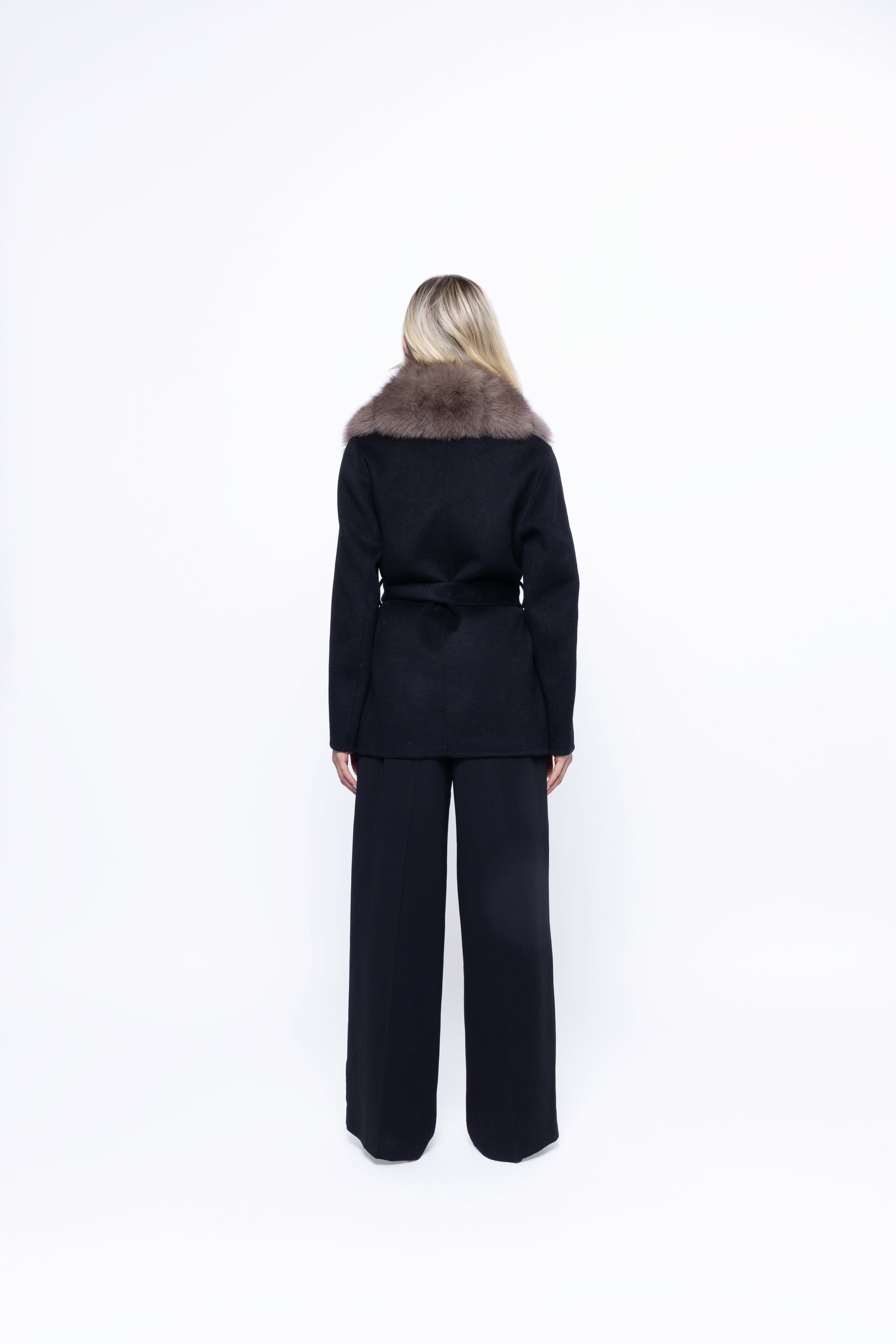 Knit sleeve detail on the Noir Luxe faux fur coat