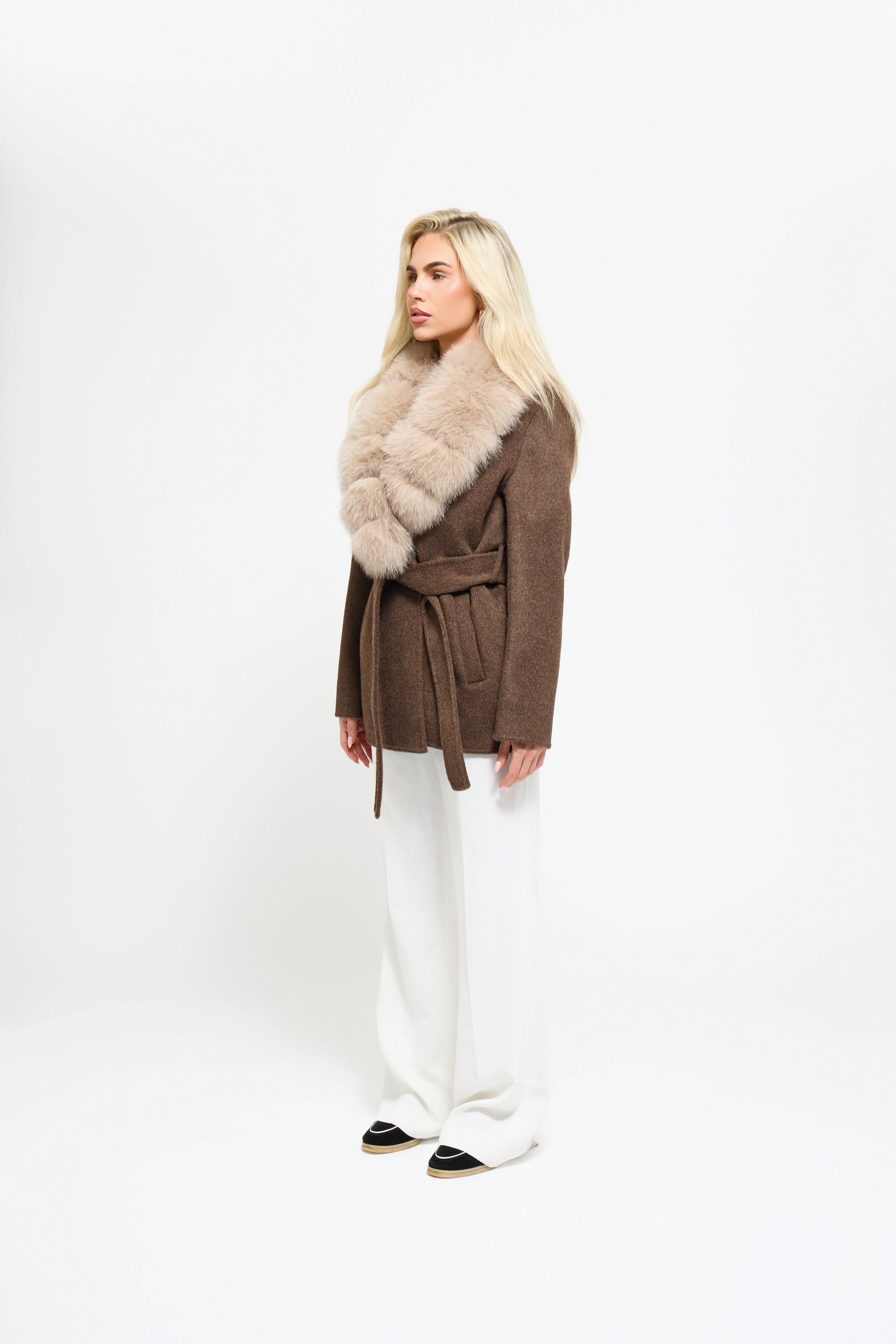 Noir Luxe faux fur coat in brown worn by a model