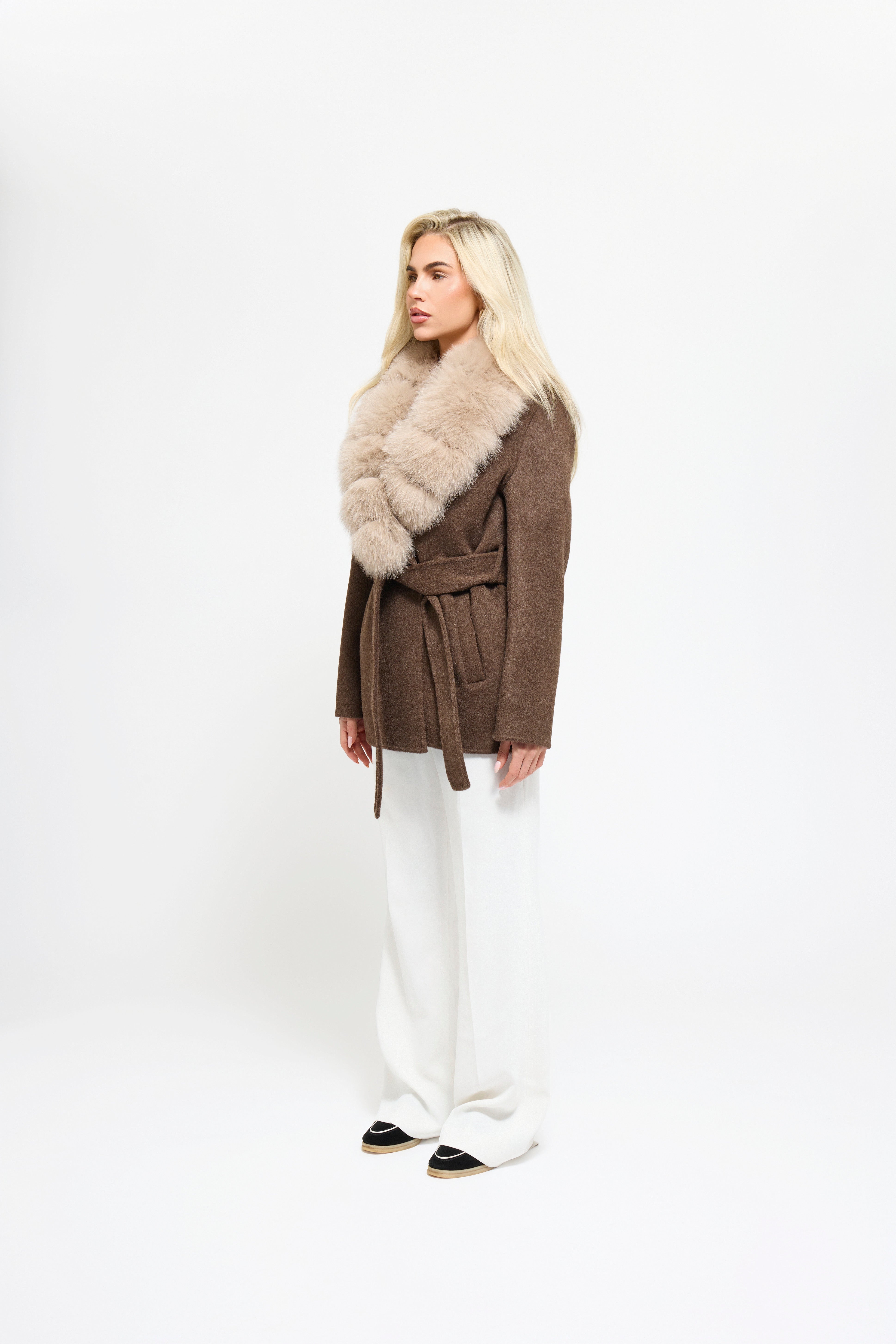 Noir Luxe faux fur coat in brown worn by a model