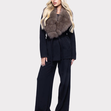 Navy coat and tailored trousers