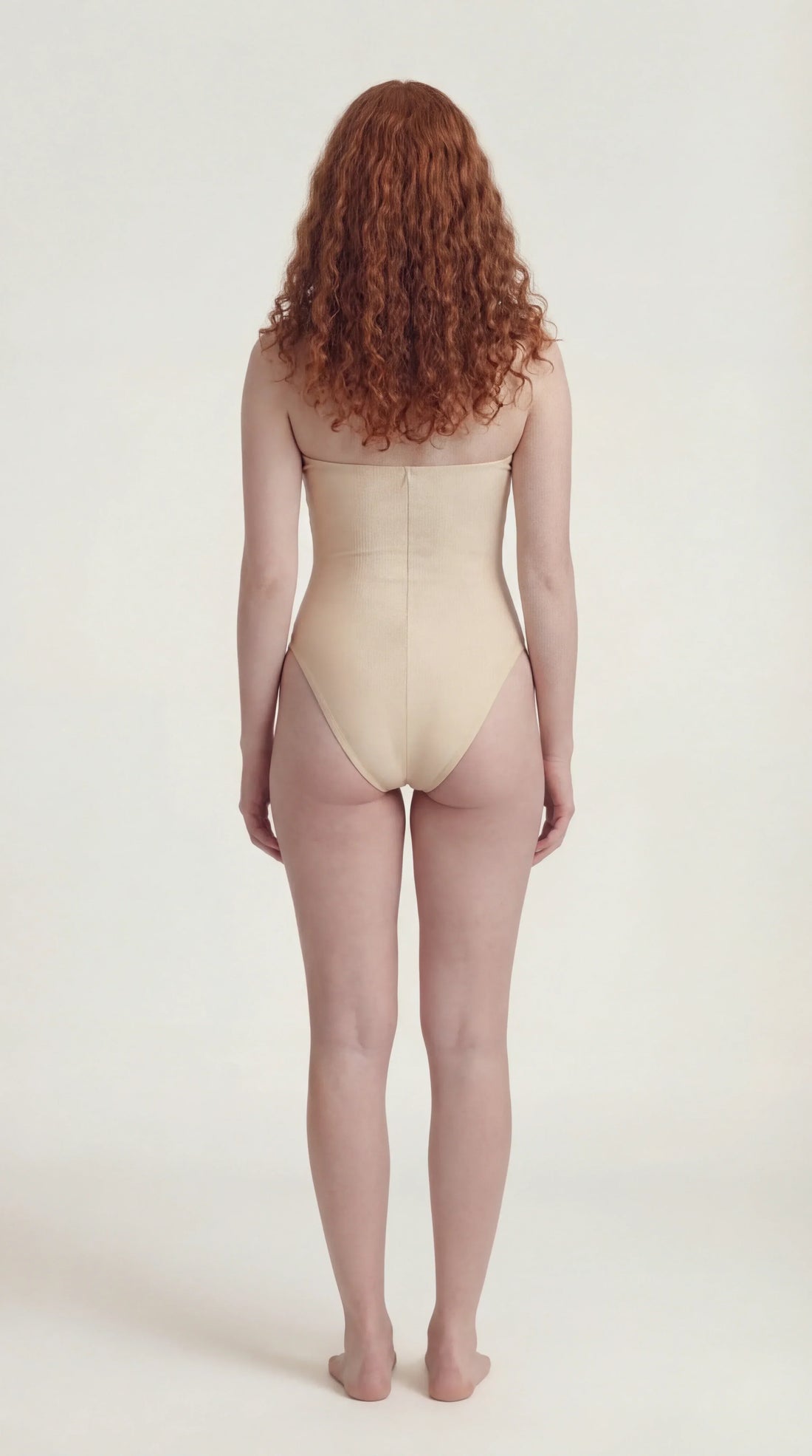 Front view of the Ninna Suelly white bodysuit