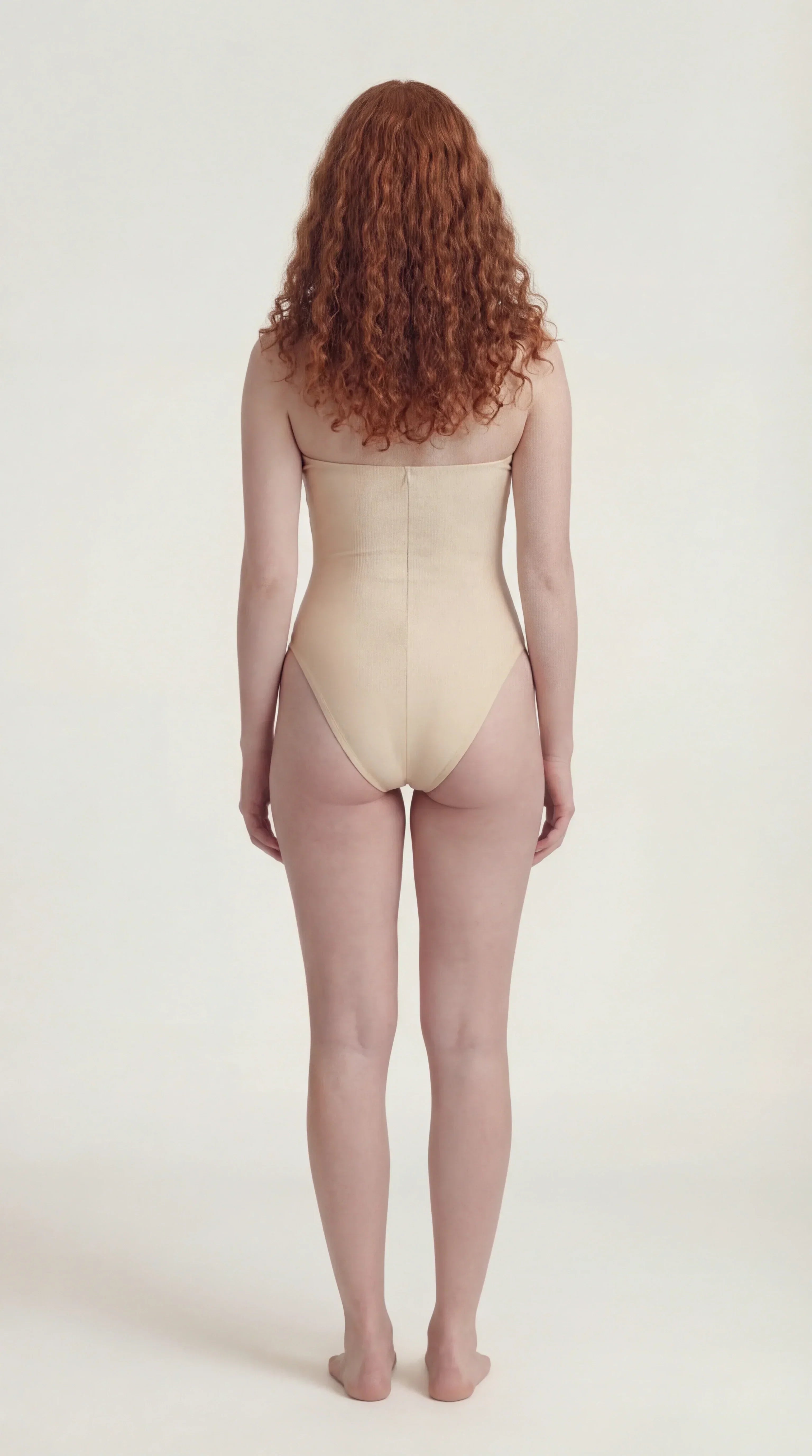 Back view of the Ninna Suelly white bodysuit