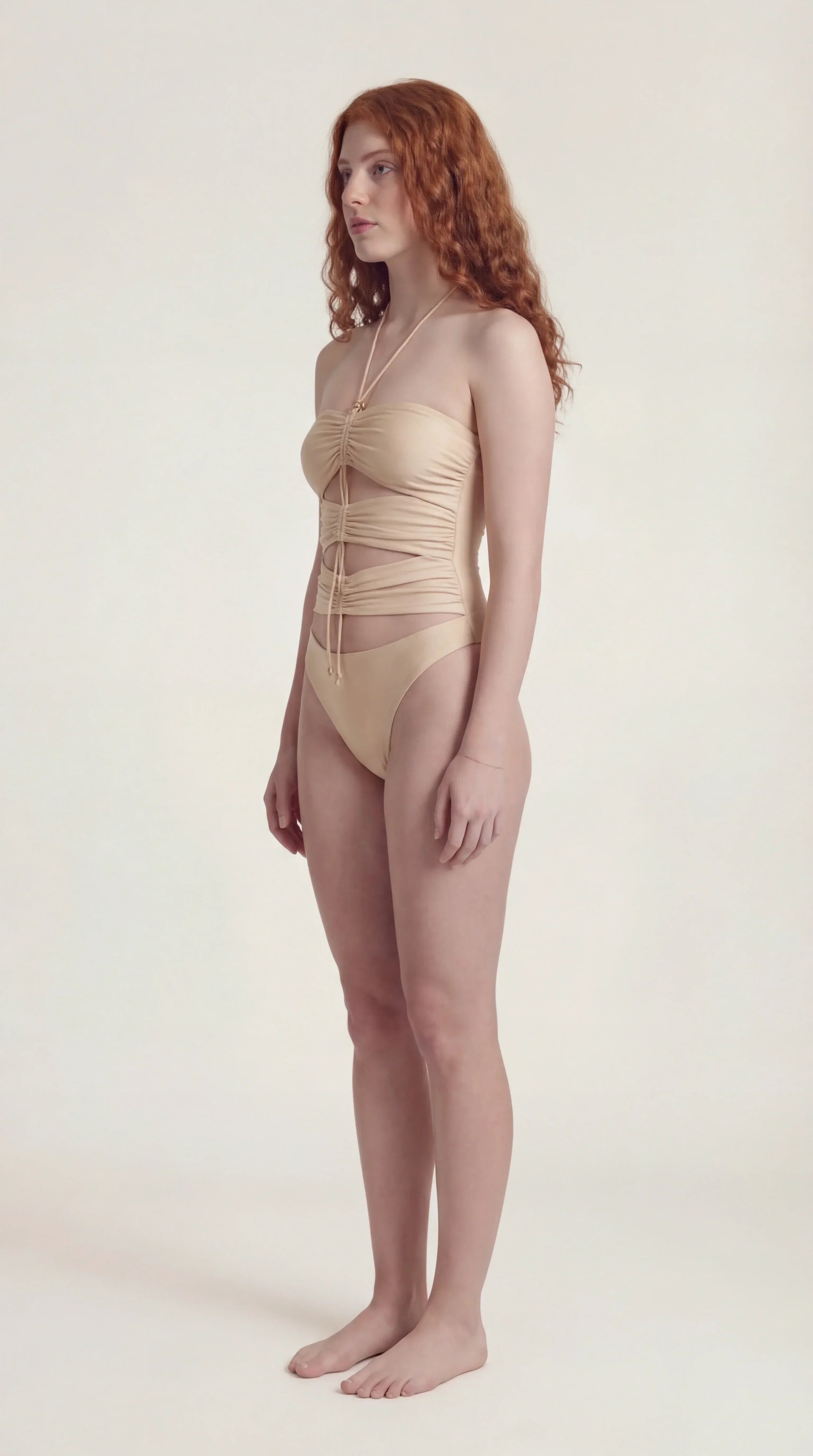 Right side view of the Ninna Suelly white bodysuit