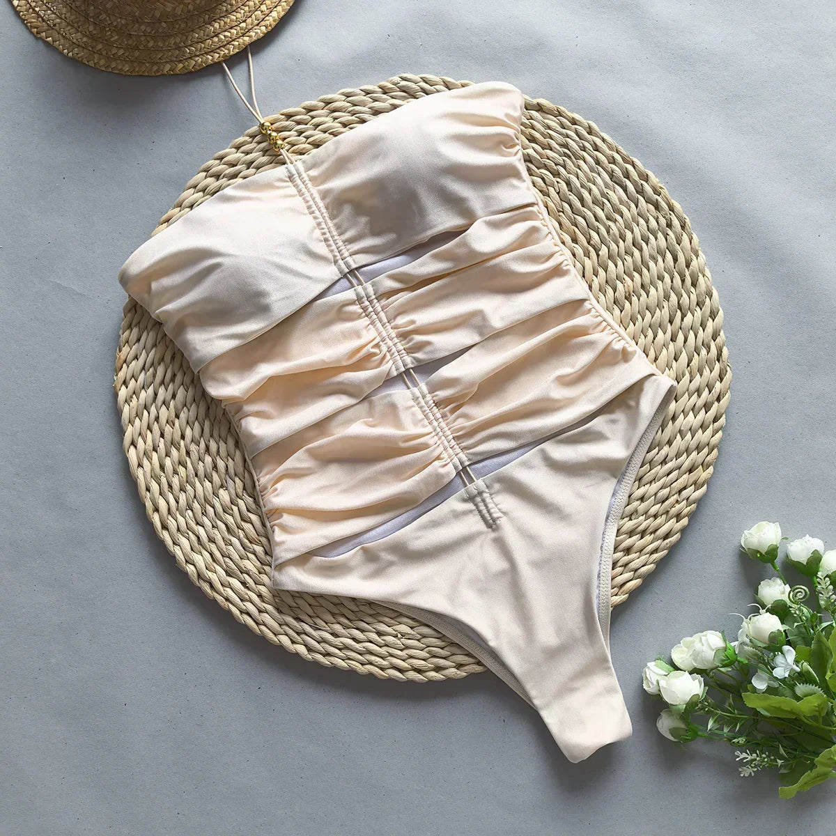 Ninna Suelly white bodysuit shown at the beach