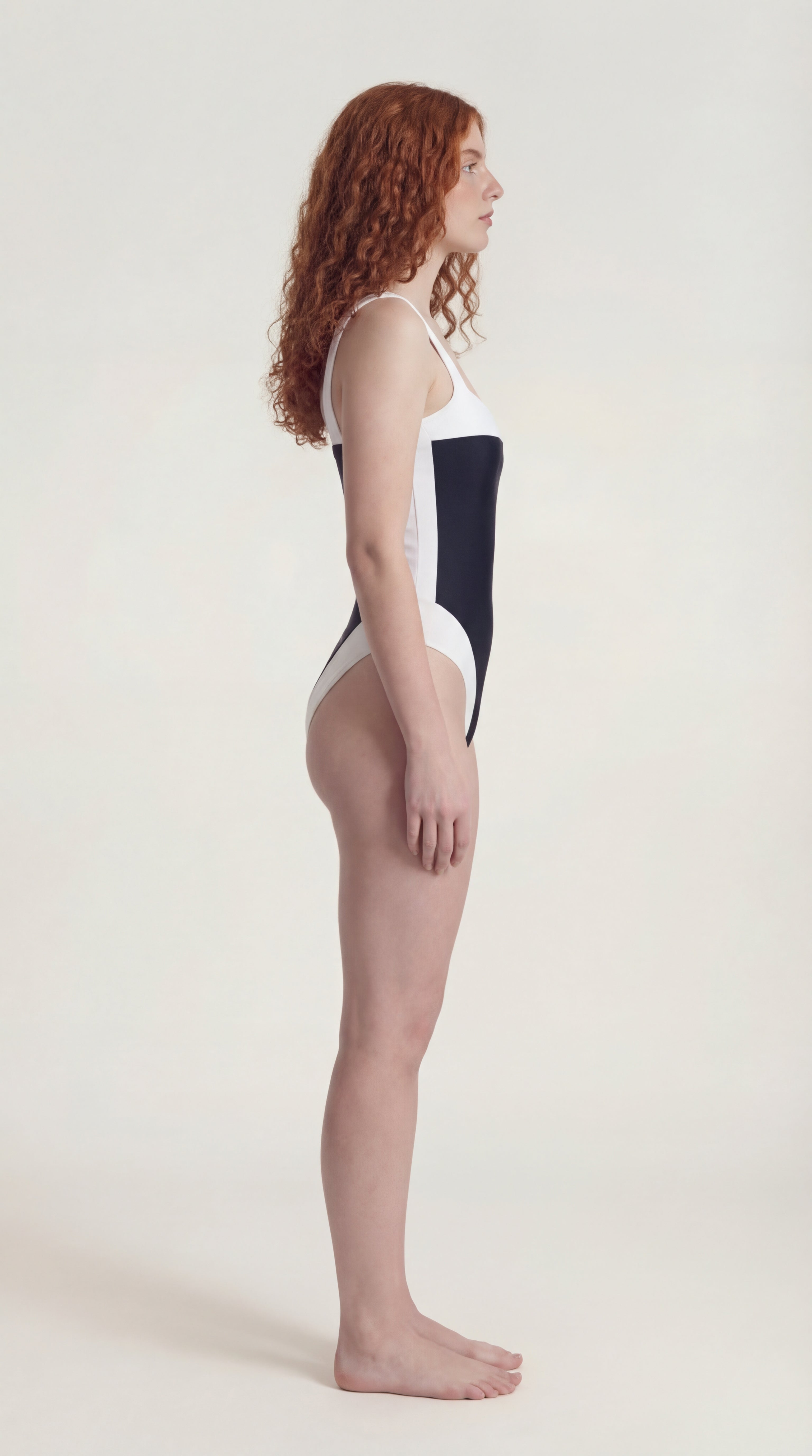 Side view of the Ninna Tessa black bodysuit